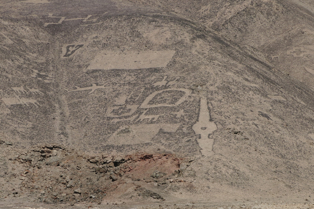 The geoglyph of a shark with its jaws open, under the large upper rectangle.